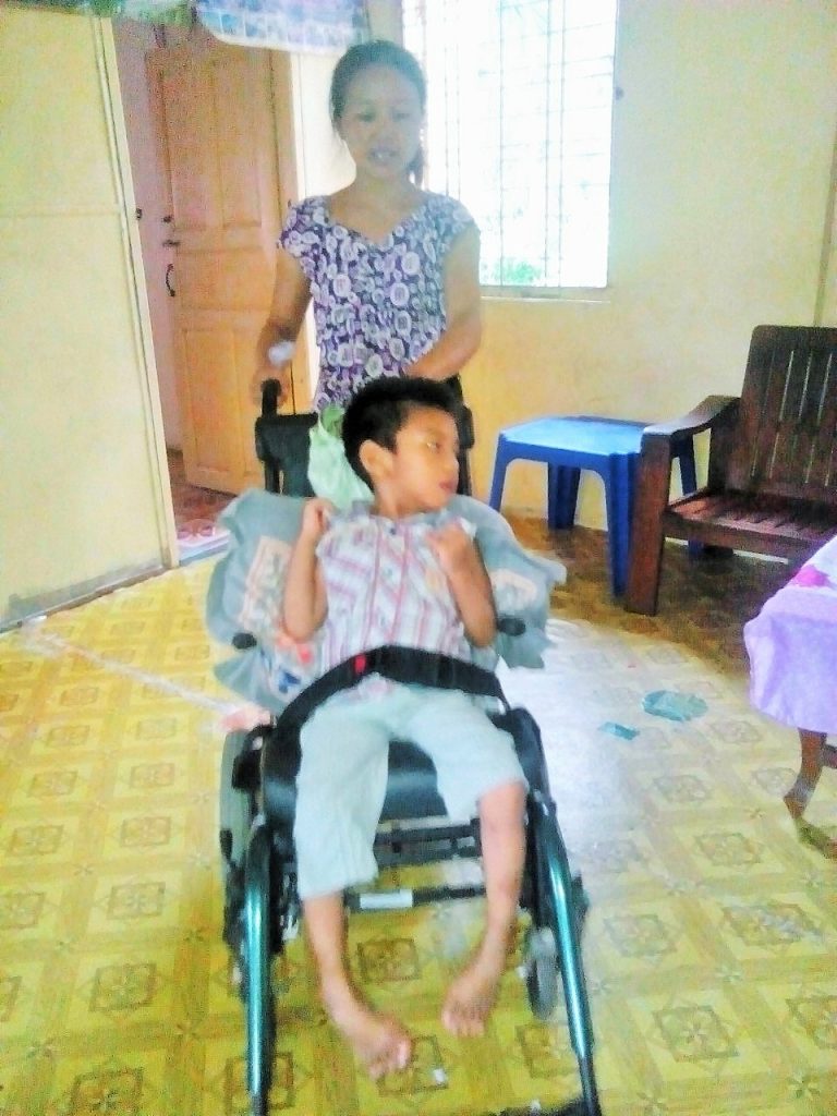 June - Myanmar orphan with Wheel Chair