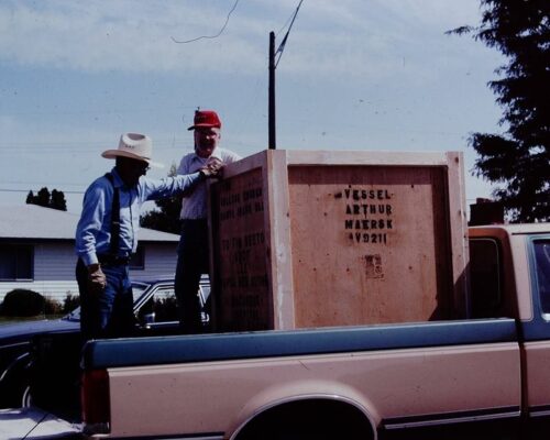 Rich Murtland and Charles Thornburg loading Hands of Hope's first shipment, a 4-foot crate for Papua New Guinea, in 1992