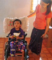 Myanmar boy with Wheelchair